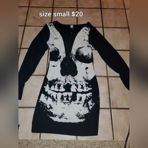Black long sleeve dress with a skull on it